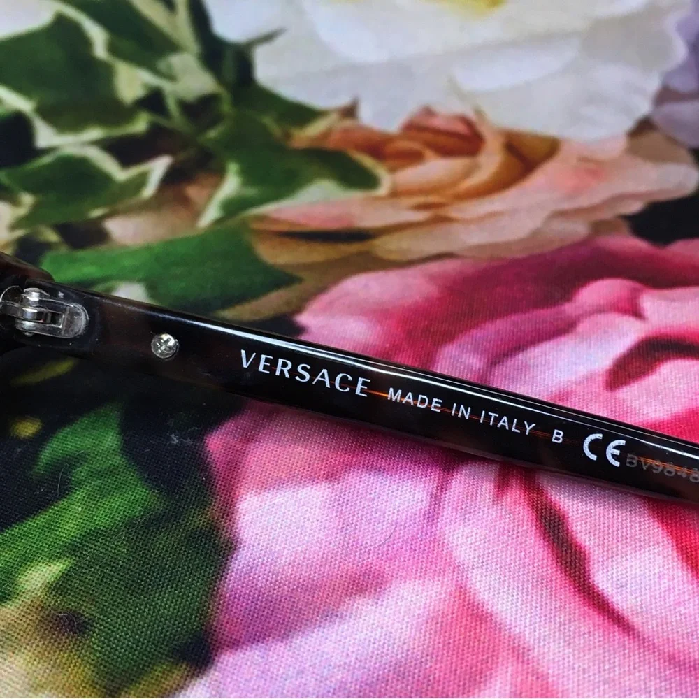 Versace orange & black tortoise frames glasses  Silver medusa face logo corners